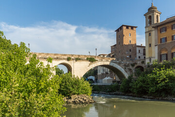 Fototapeta na wymiar Castello Caetani, Tiber River and Pons Fabricius in city of Rome, Italy