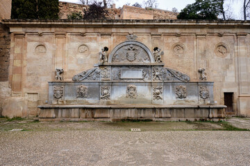 Fountain located at the entrance of the Gate of Justice or Bab al-Sharia of the Alhambra.