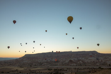 Cappadocia. Hot air balloons on the sky in Goreme. Travel to Turkey background