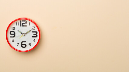 Fototapeta na wymiar Red alarm clock on color background, top view