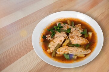 Chicken with rice and spices tasty dish in a plate