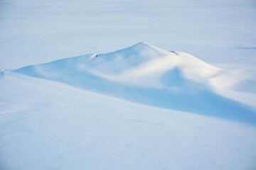 Ice hummocks on the coast of the Gulf of Finland in the spring (winter) season. Zelenogorsk, St. Petersburg, Russia.