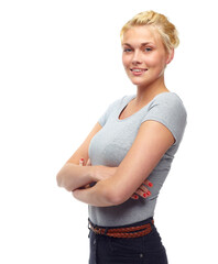 Young and confident. Studio shot of a beautiful young woman with her arms crossed isolated on white.