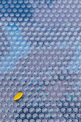 bubble wrap texture over pool cover outdoors