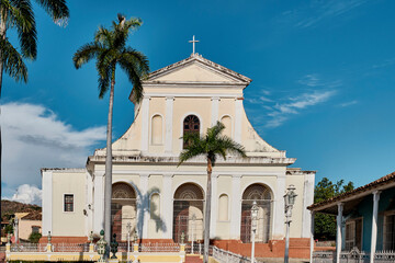Fototapeta na wymiar Church of Holy Trinity of 19th century on main square of city Trinidad, Cuba.