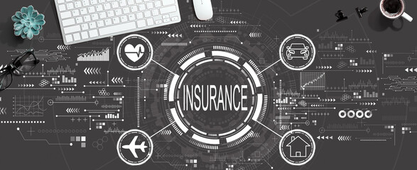 Insurance concept with a computer keyboard and a mouse