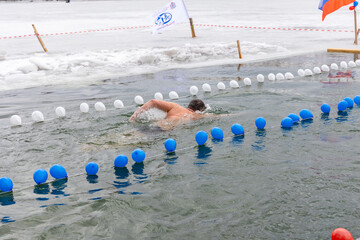 Winter recreation activities, walruses, healthy lifestyle, hardening, swimming in the hole,...