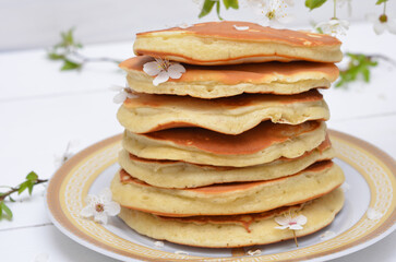 stack of fluffy pancakes in a plate close-up