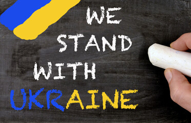 We stand with Ukraine blackboard and ukrainian colors