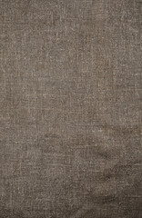 Fototapeta na wymiar Burlap, natural coarse cloth, tablecloth with folds