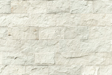 Reinforced wall texture with rectangular stone blocks.