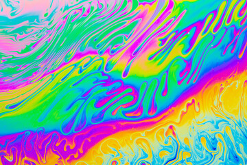 Psychedelic multicolored background abstract. Rainbow colors. patterns background. Photo macro shot of soap bubbles