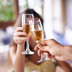 Celebrating with bubbly. A happy couple toasting with champagne.