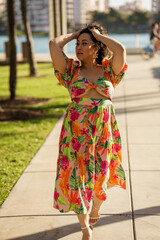 Attractive lady walking and playing with hair