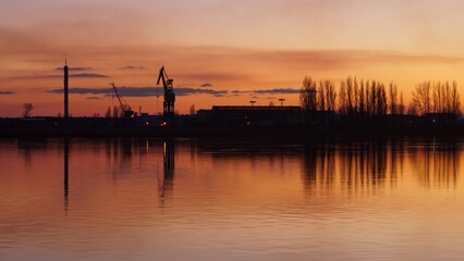 Fototapeta premium View of the Vistula River in Płock during sunset.