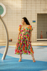 Female model posing in a water park