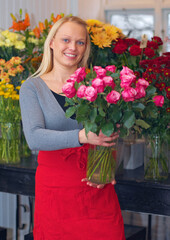 Im a master florist. A cropped shot of a woman standing with a bouquet of flowers.