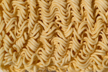 close-up raw asian instant noodles, ready-to-go food and economical of the ASEAN people image on white background