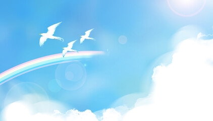 White birds flying in the sky with rainbow.