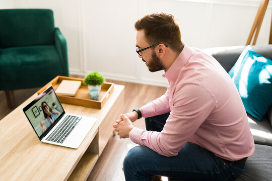 Young Man Speaking With A Virtual Doctor