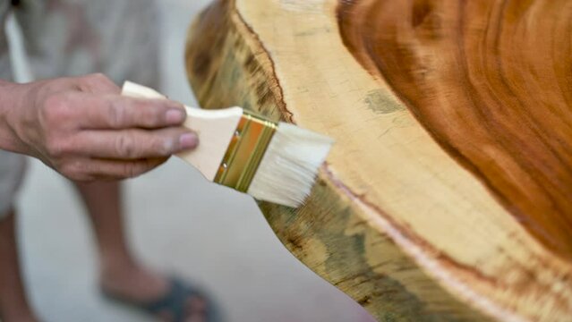 Apply a lacquer to coat the wood for durability and shine.