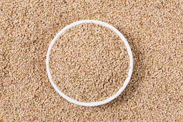 close up of sesame seeds in plate background