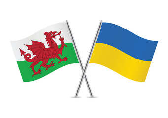Wales and Ukraine crossed flags. Welsh and Ukrainian flags, isolated on white background. Vector icon set. Vector illustration. - obrazy, fototapety, plakaty