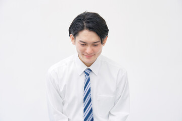 ビジネスマン　お辞儀　白背景