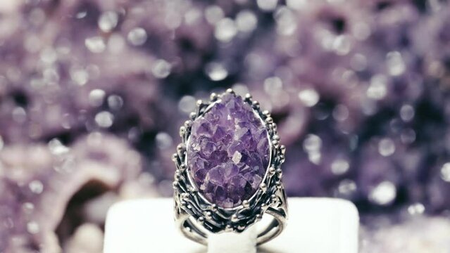 Close-up shot of amethyst ring. slow motion . 4K