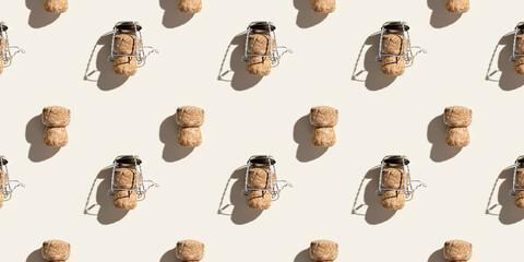 Creative pattern with champagne cork on beige background with hard light and shadows at sunlight....