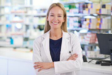 How can I assist you today. Portrait of an attractive pharmacist at work. - obrazy, fototapety, plakaty
