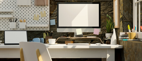 Modern contemporary office space with computer mockup over loft stone wall.