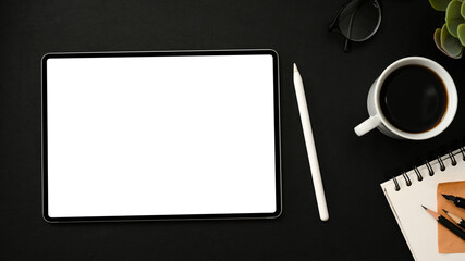 Dark modern workplace with portable touchpad