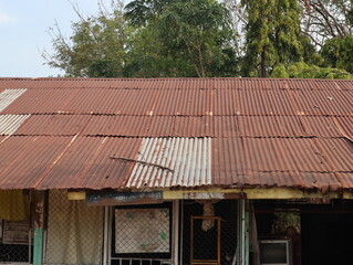The roof of the house was exposed to the sun until the rust