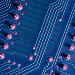 Square photo of a printed circuit board with soldering
