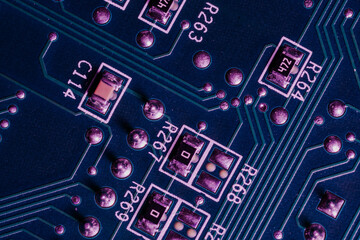 Electronic elements on the printed circuit board of the device with labels close-up