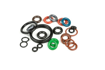 Hydraulic and pneumatic o-rings in black in different sizes on a white background. Various seals...