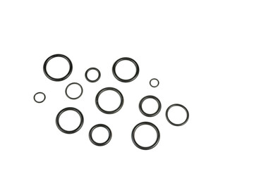 Hydraulic and pneumatic o-rings in black in different sizes on a white background. Various seals for plumbing. Sealing rings for hydraulic connections.
