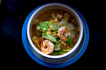 Background of food menu (stir-fried noodles with fresh shrimp), a cup for cooking at home or serving food to customers.