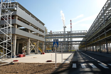 Shymkent / Kazakhstan - 09.26.2018 : Tanks, pipes and metal structures at the Petro Kazakhstan oil processing plant.