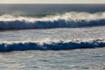 waves crashing on rocks