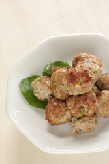 Homemade Chinese food, pork meat ball on lettuce with copy space