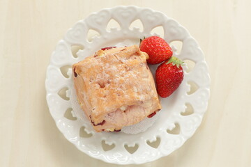Homemade strawberry scone in pink color for breakfast image