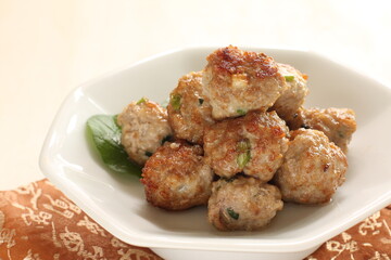 Homemade Chinese food, pork meat ball on lettuce with copy space
