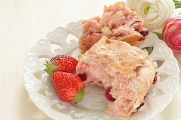 Homemade strawberry scone in pink color for breakfast image
