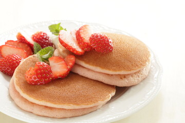 Homemade strawberries and pancake in pink color for cafe food 