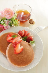 Homemade strawberries and pancake in pink color for cafe food 