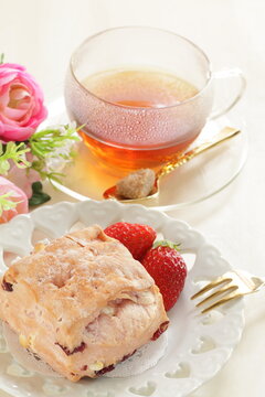 Homemade strawberry scone in pink color for breakfast image