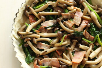 Japanese Shimeji mushroom and bacon stir fried in dough for quiche cooking image
