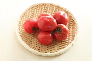 Freshness Japanese tomato on bamboo basket with copy space